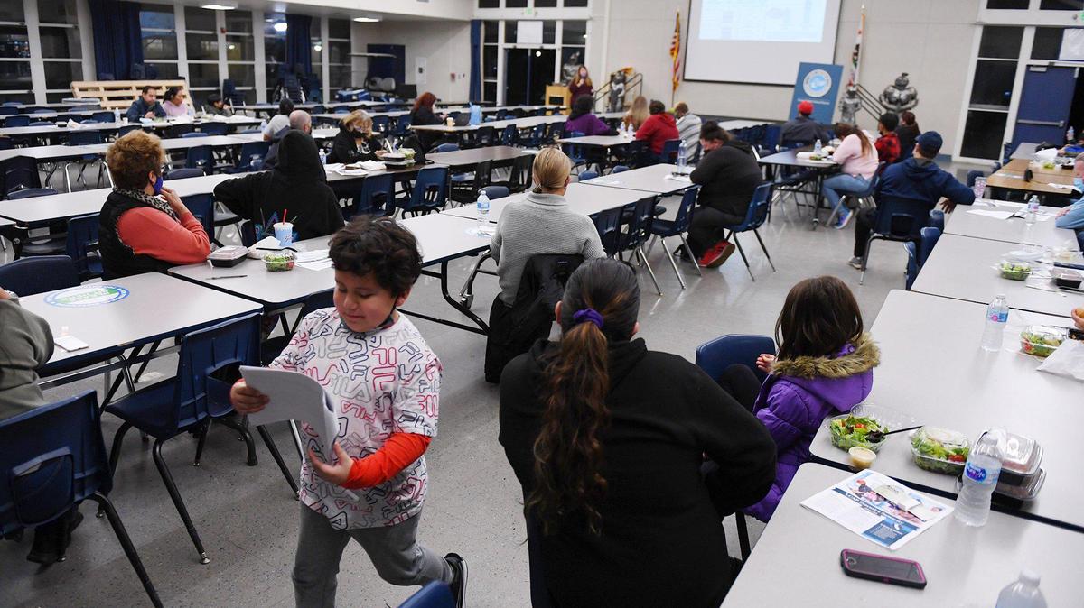 Parents and families attend a community meeting at Bullard High showcasing the Local Control & Accountability Plan (LCAP) for parents, to help address ways to improve the city’s low performing schools in Fresno Unified School District Thursday night, Jan. 13, 2022 in Fresno.