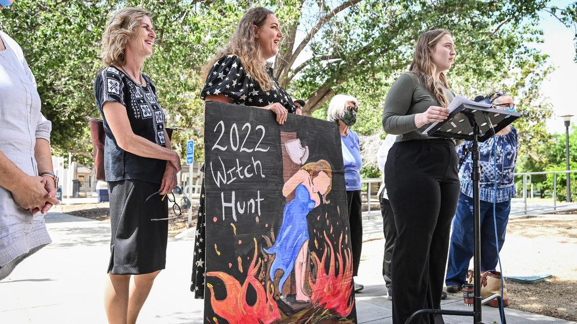 Organizer Loralee Bergdall, right, leads a news conference speaking out against a political flyer from Madera County supervisor candidate Mark Reed naming several county citizens as “far left” supporters of his “opponent” in the June 7 election, in Fresno on Thursday, June 2, 0222.