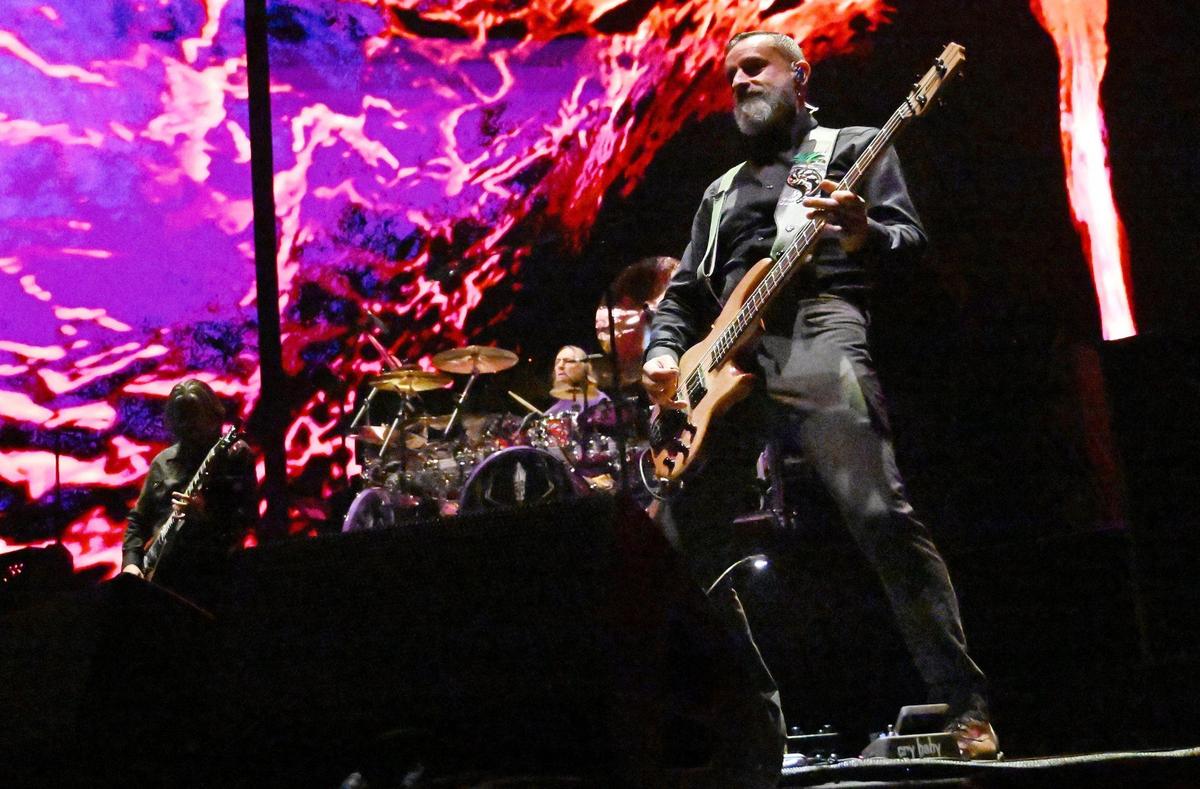Tool’s bassist Justin Chancellor, right, performing at the Save Mart Center Monday, Feb 12, 2024 in Fresno.