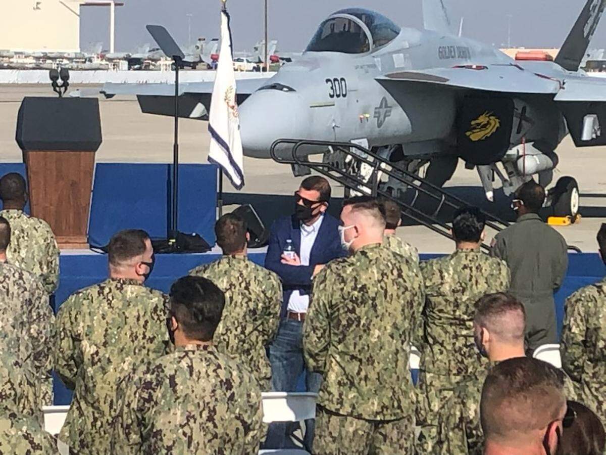 Rep. David Valadao, a Republican from Hanford, speaks with a sailor at NAS Lemoore while waiting for the arrival of Vice President Mike Pence.