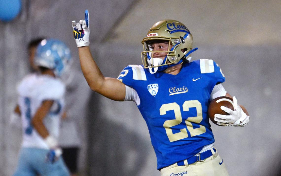 Clovis High’s Maddox Merrill raises a finger as he scores a touchdown against Bullard Friday night, Sept. 20, 2024 at Lamonica Stadium in Clovis.