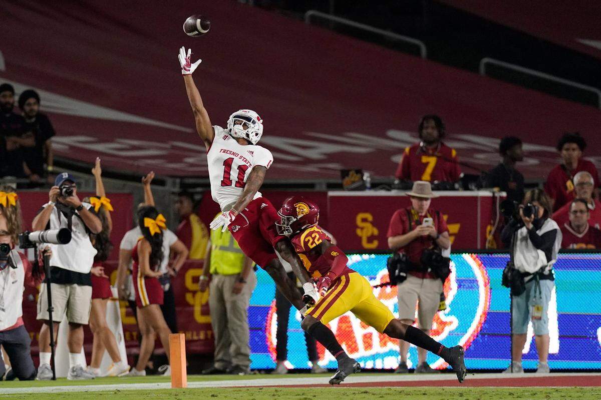 Fresno State wide receiver Josh Kelly, left, can’t reach a pass as Southern California defensive back Ceyair Wright defends during the first half of an NCAA college football game Saturday, Sept. 17, 2022, in Los Angeles. (AP Photo/Mark J. Terrill)
