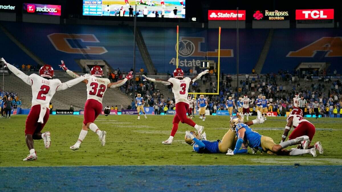 Fresno State players celebrate after an incomplete Hail Mary pass to end the NCAA college football game against UCLA Sunday, Sept. 19, 2021, in Pasadena, Calif. (AP Photo/Marcio Jose Sanchez)
