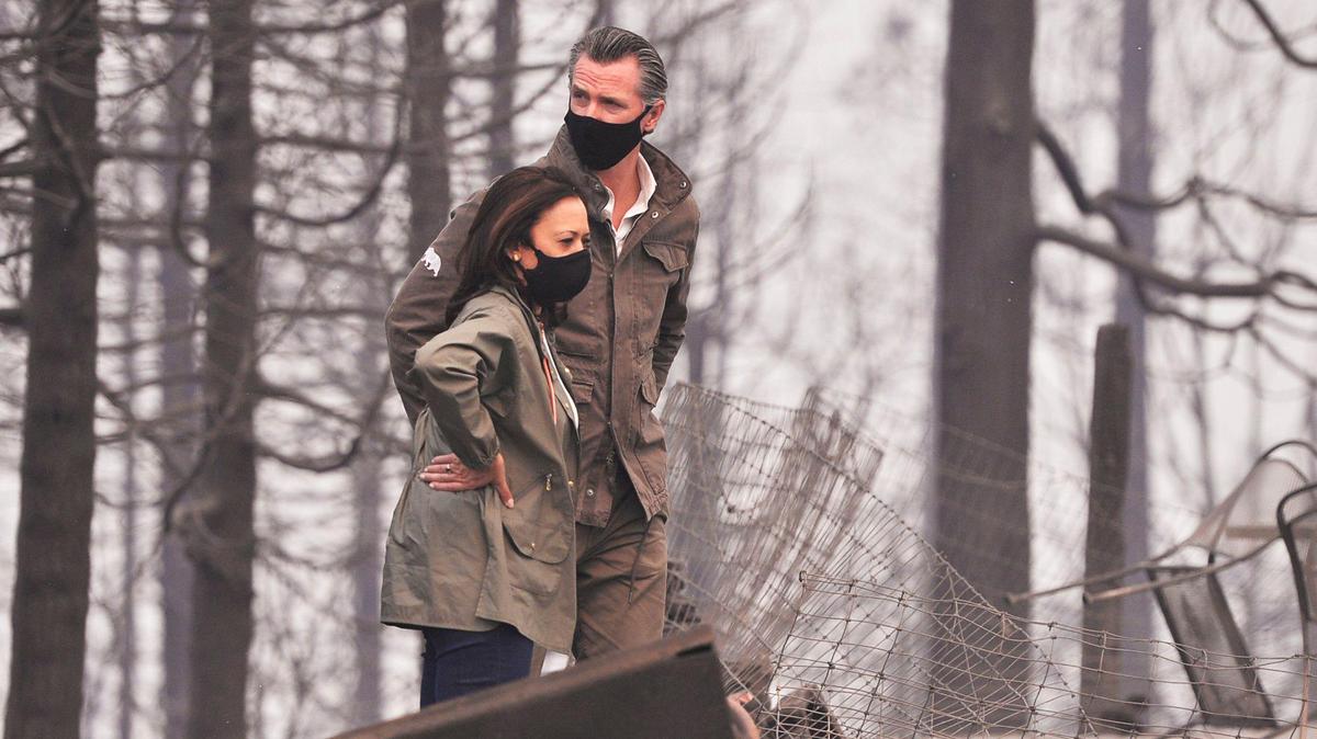 Sen. Kamala Harris and California Gov. Gavin Newsom view Creek Fire wildfire damage Tuesday, Sept. 15, 2020 in Auberry, California.