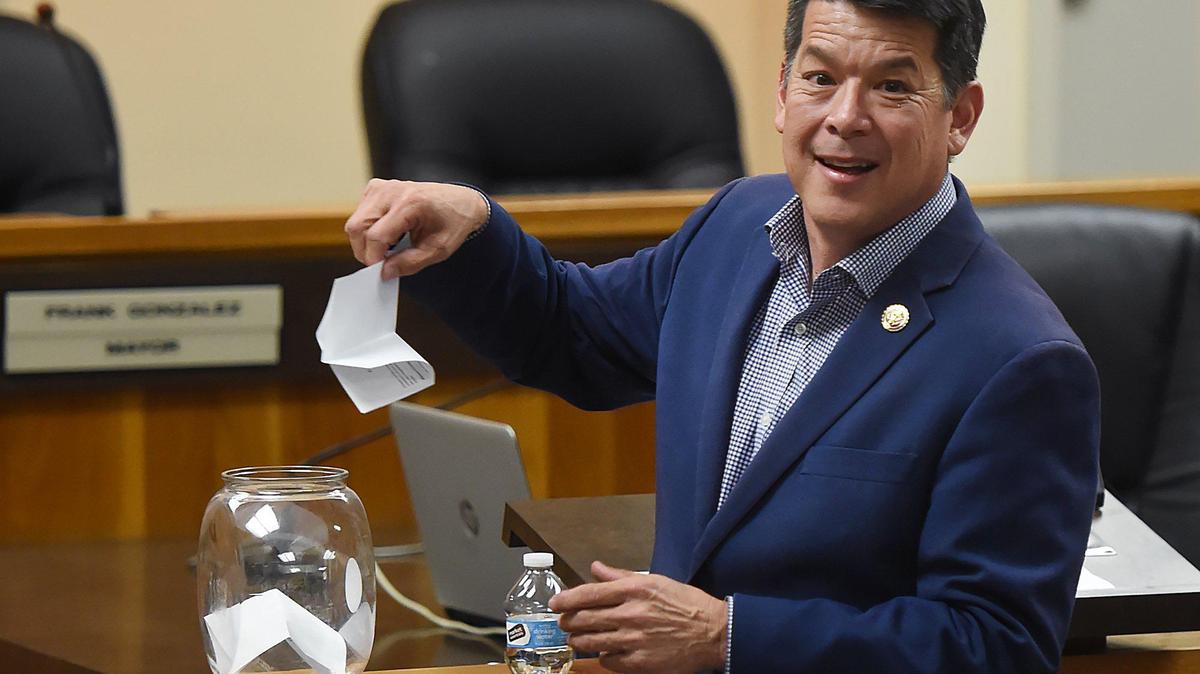California Congressman TJ Cox chooses another question from a jar as he speaks at a town hall event held at Sanger’s City Hall about issues facing Central Valley families Tuesday, Oct. 8, 2019 in Sanger.