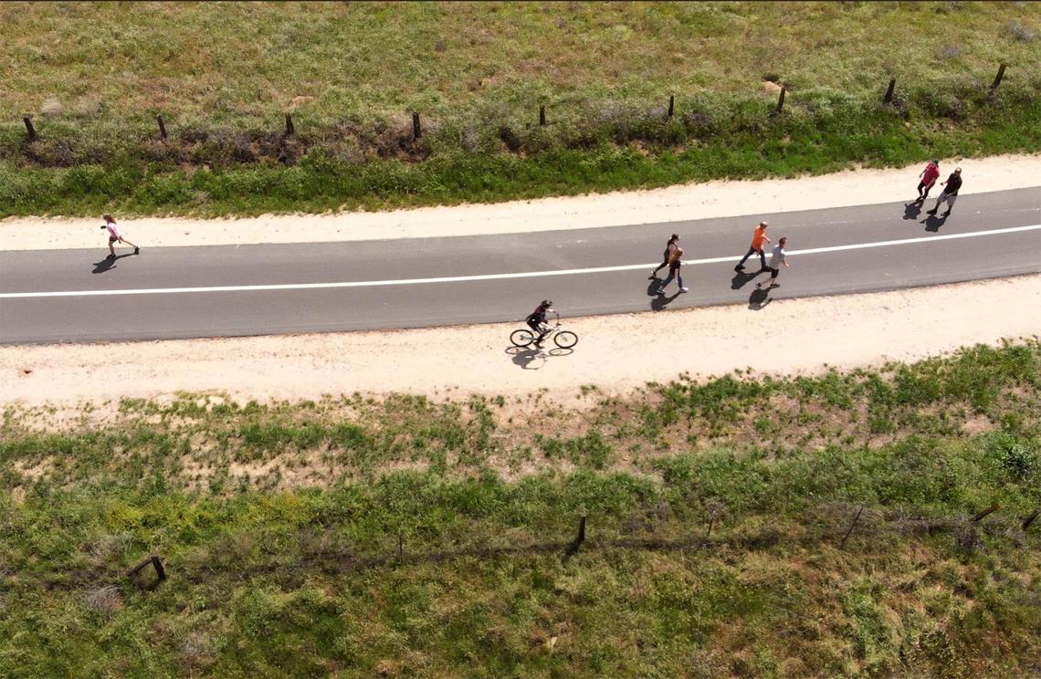 A sparsely traveled Lewis S. Eaton Trail north of Woodward Park as new restrictions are in place for the public Easter Sunday, April 12, 2020 in Fresno.