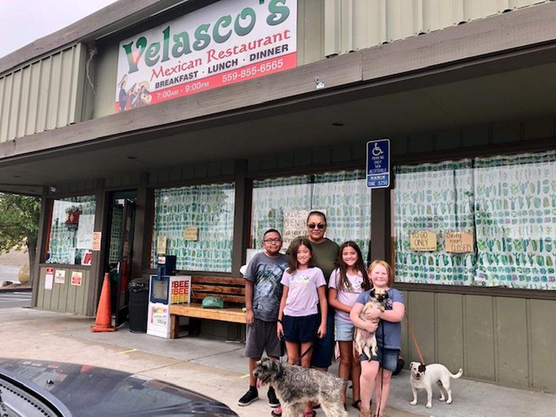 Anna Velasco, longtime owner of Velasco’s Mexican Restaurant in Prather, evacuated from Auberry on Monday, Sept 7, 2020 due to the Creek Fire. Velasco and her family - including five grandchildren, two sons, a niece, nephew, several dogs and two sheep - are planning to stay in Fresno for the night.