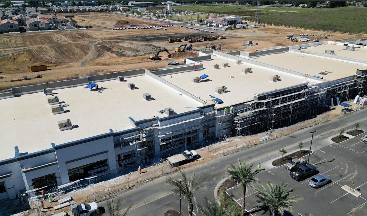 Grading of land continues behind the new Loma Vista Marketplace shopping center, located at Shaw and Leonard avenues, photographed Thursday, July 10, 2025 in Clovis.