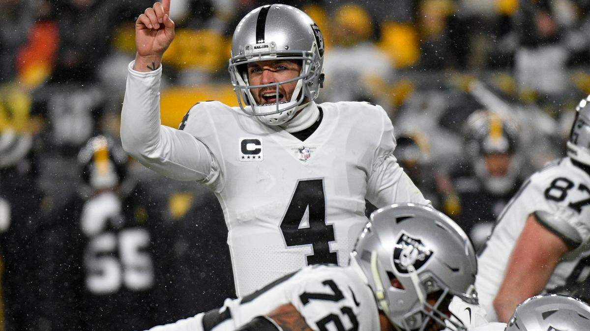 Las Vegas Raiders quarterback Derek Carr calls signals during the first half of an NFL game against the Pittsburgh Steelers in Pittsburgh, Saturday, Dec. 24, 2022.