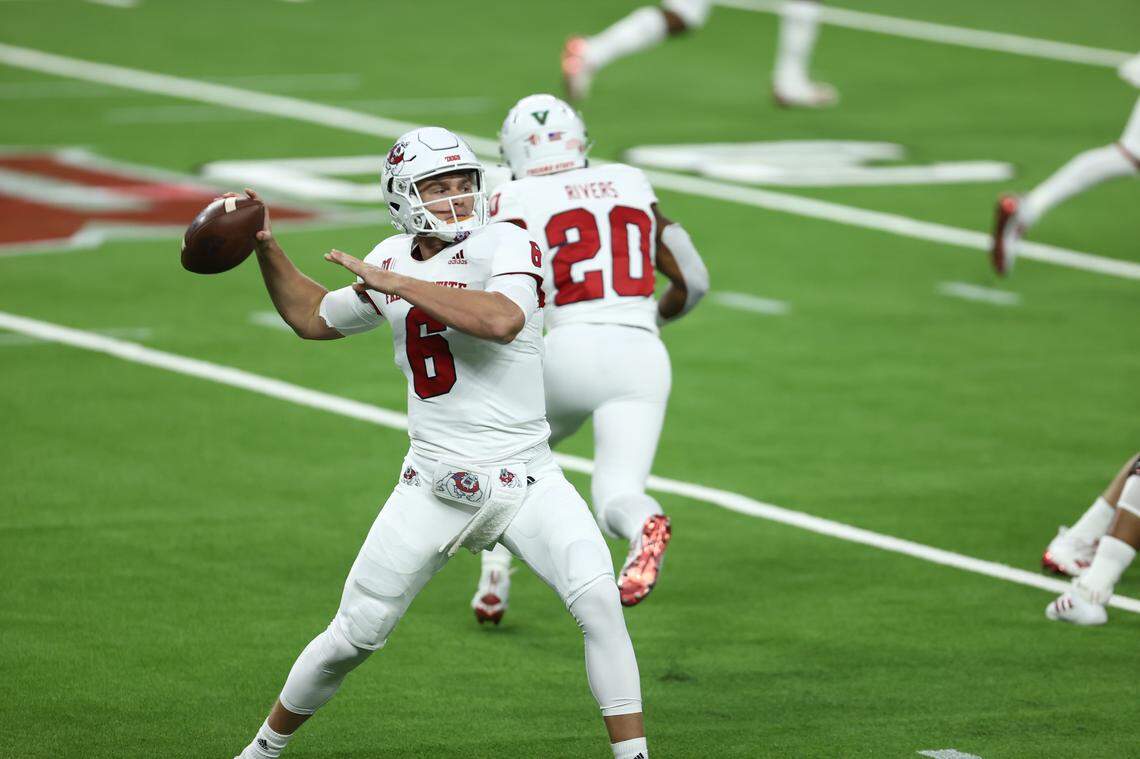 Fresno State quarterback Ben Wooldridge throws a pass in the Bulldogs’ 40-27 victory at UNLV Saturday, Nov. 7, 2020. Wooldridge came off the bench to lead three scoring drives.