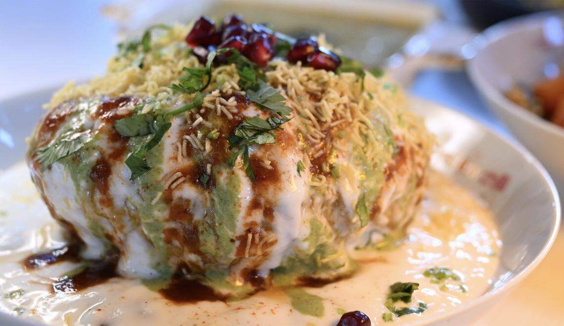 Raj Kachori, a starter on a garbanzo base topped with pomegranate seeds is served at The Yellow Chilli Wednesday Jan. 7, 2026.