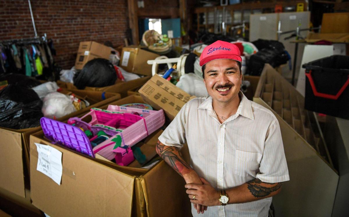Anthony “AP” Armour, executive director of Neighborhood Industries, stands in the warehouse area at Neighborhood Thrift in the Tower District on Thursday, June 11, 2020. In a partnership with Bitwise Neighborhood Industries began providing grocery and everyday items delivery services for people in need during the COVID-19 crisis.