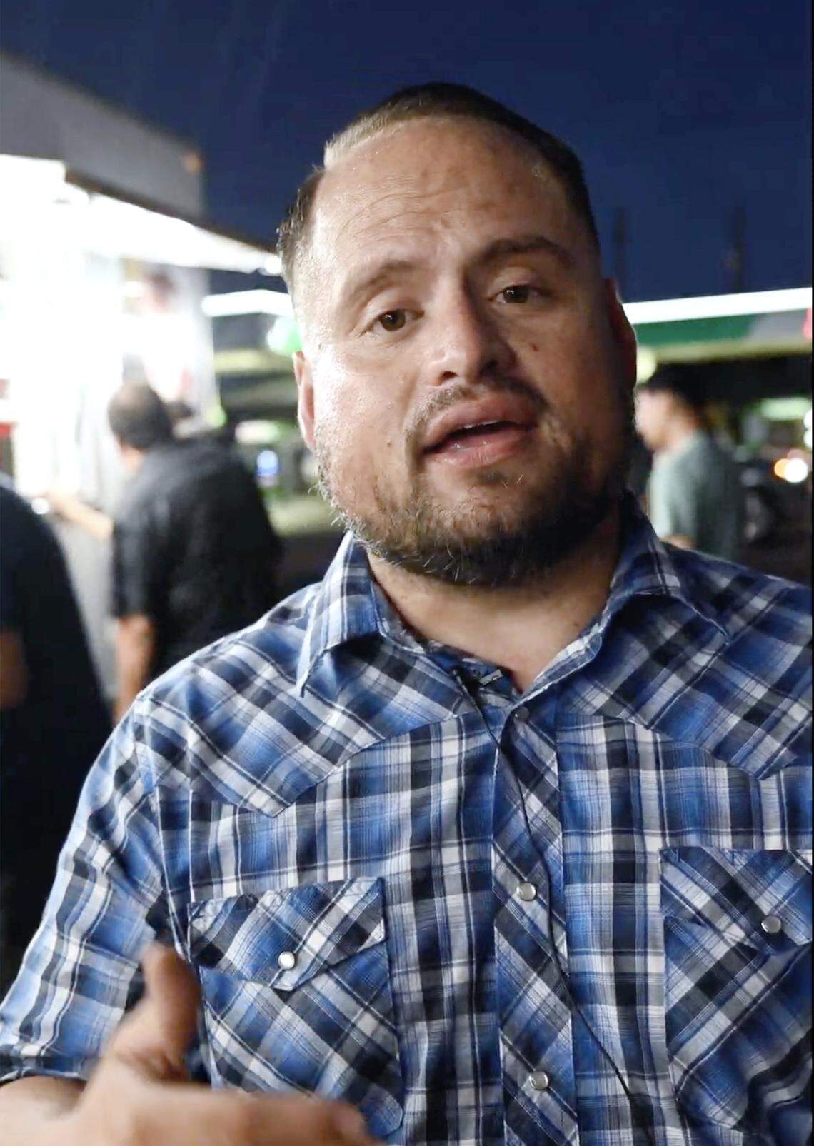 Armando Arias Jr. is interviewed outside his food truck Tacos El Cabezon, parked at Shaw and Maroa avenues Wednesday, Sept 24, 2025 in Fresno.