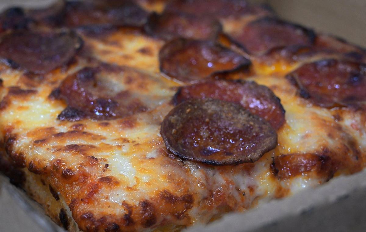Andrew DiNuzzo offers San Francisco Squares, an 8-inch by 8-inch personal pizza similar but thinner than a Detroit-style pizza at Roma Italian Kitchen. Pepperoni is always on the menu but each day features a special offering.