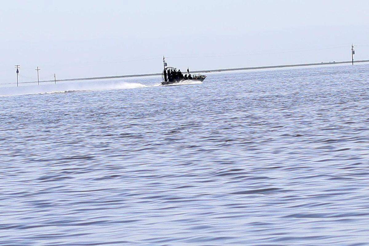 A boat is seen west of 6th Avenue Tuesday, April 25, 2023 south of Corcoran, CA.