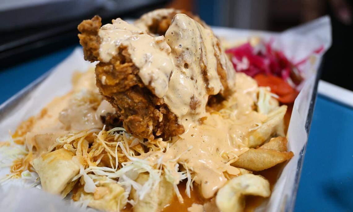 Pollo con Tajadas, chicken with fried plantains, served at Felix and Beatriz Amador's new Keidy's Restaurant on north Blackstone Ave, the first to offer Honduran food in Fresno. Photographed July 11,2025 in Fresno.