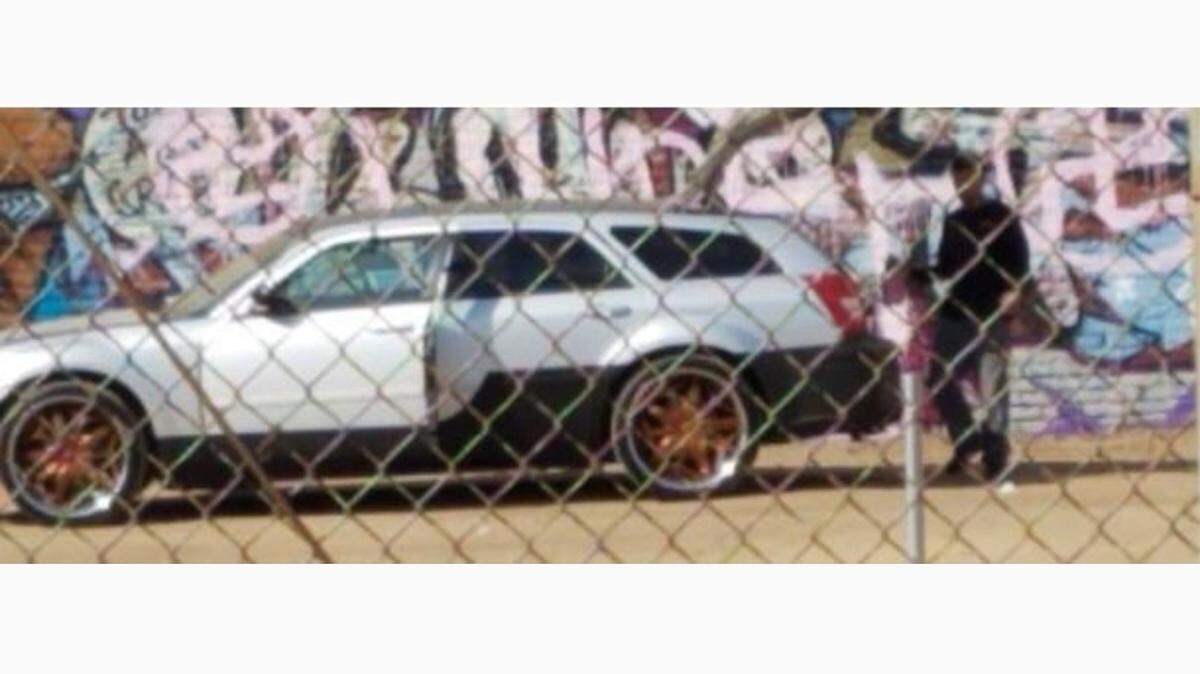 Police released a photo of the suspect and the suspect’s car after a mural was vandalized with pink swastikas.