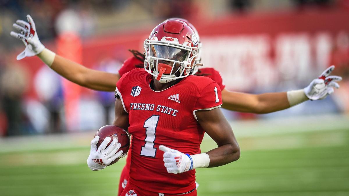 Fresno State’s DaRon Bland runs with the ball after an interception against Boise State during a game at Bulldog Stadium on Saturday, Nov. 6, 2021.
