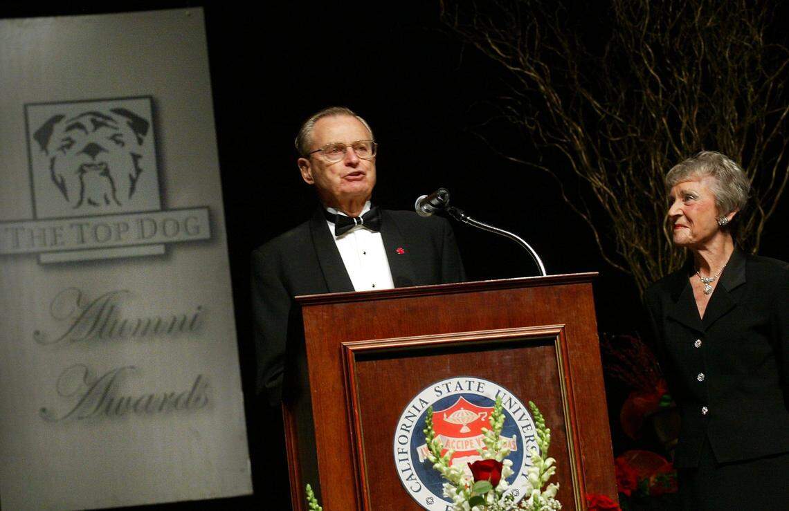 Bud and Jan Richter accept the Arthur Safstrom Service Award during Fresno State Alumni Association’s Top Dog awards ceremony at the Save Mart Center on Oct. 13, 2005.