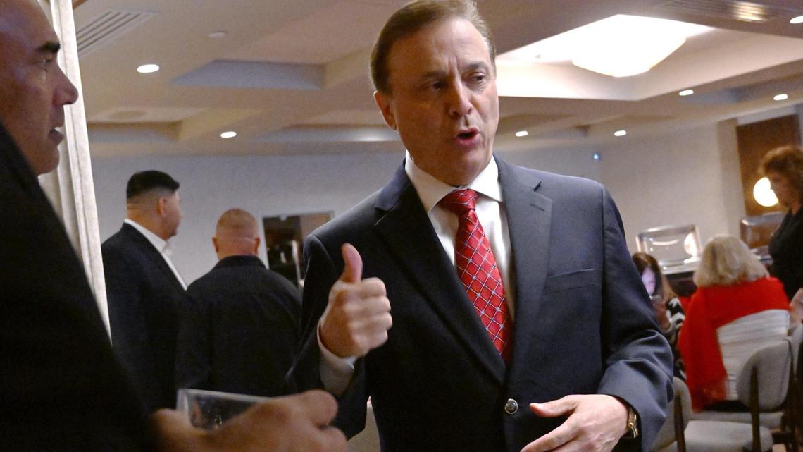 Fresno County Board of Supervisors candidate Garry Bredefeld, right, talks to guests at The Red Room Nov. 5, 2024 in Fresno.