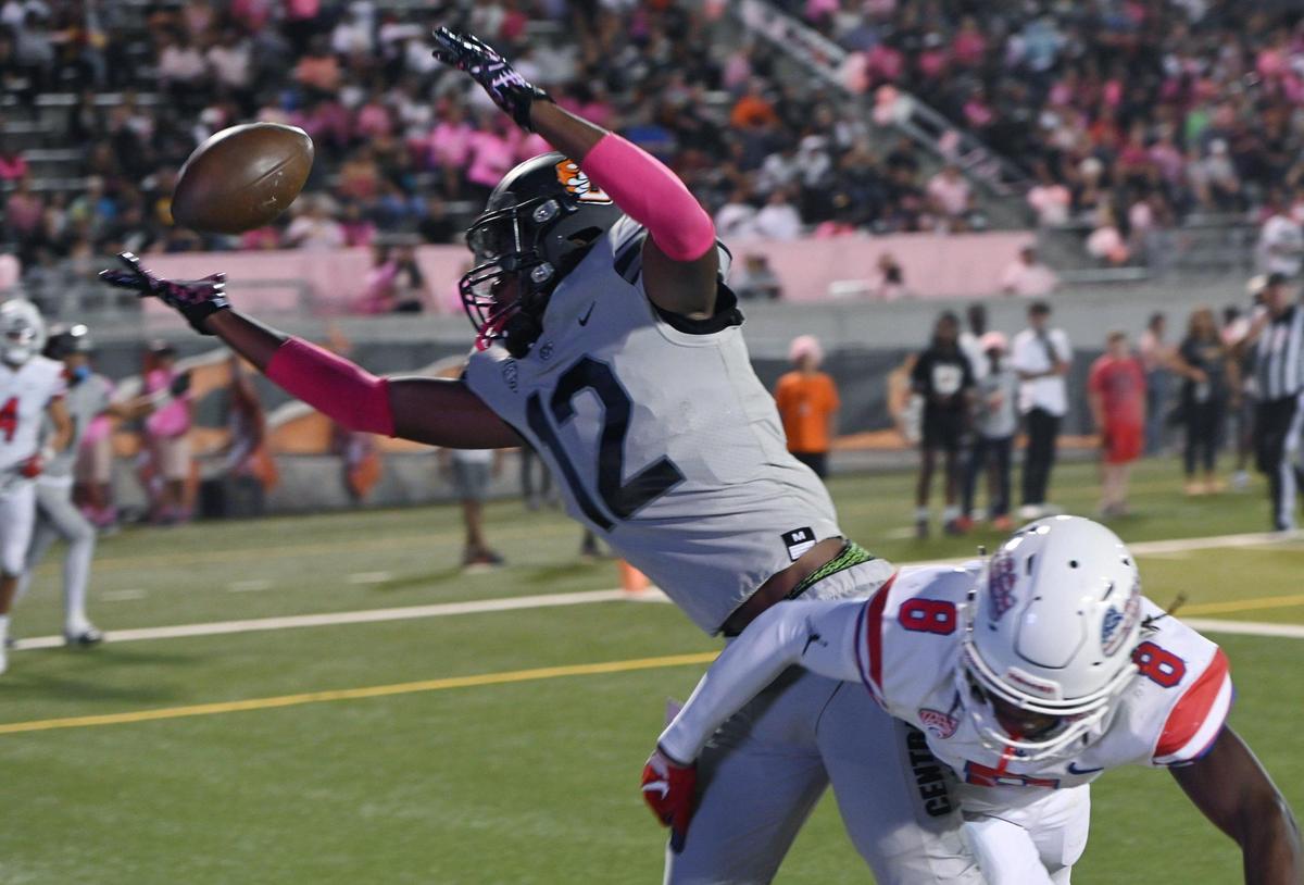 Central’s Noey Felix, left, can’t quite haul in a pass Friday, Oct. 7, 2022 in Fresno. Buchanan won 49-41.