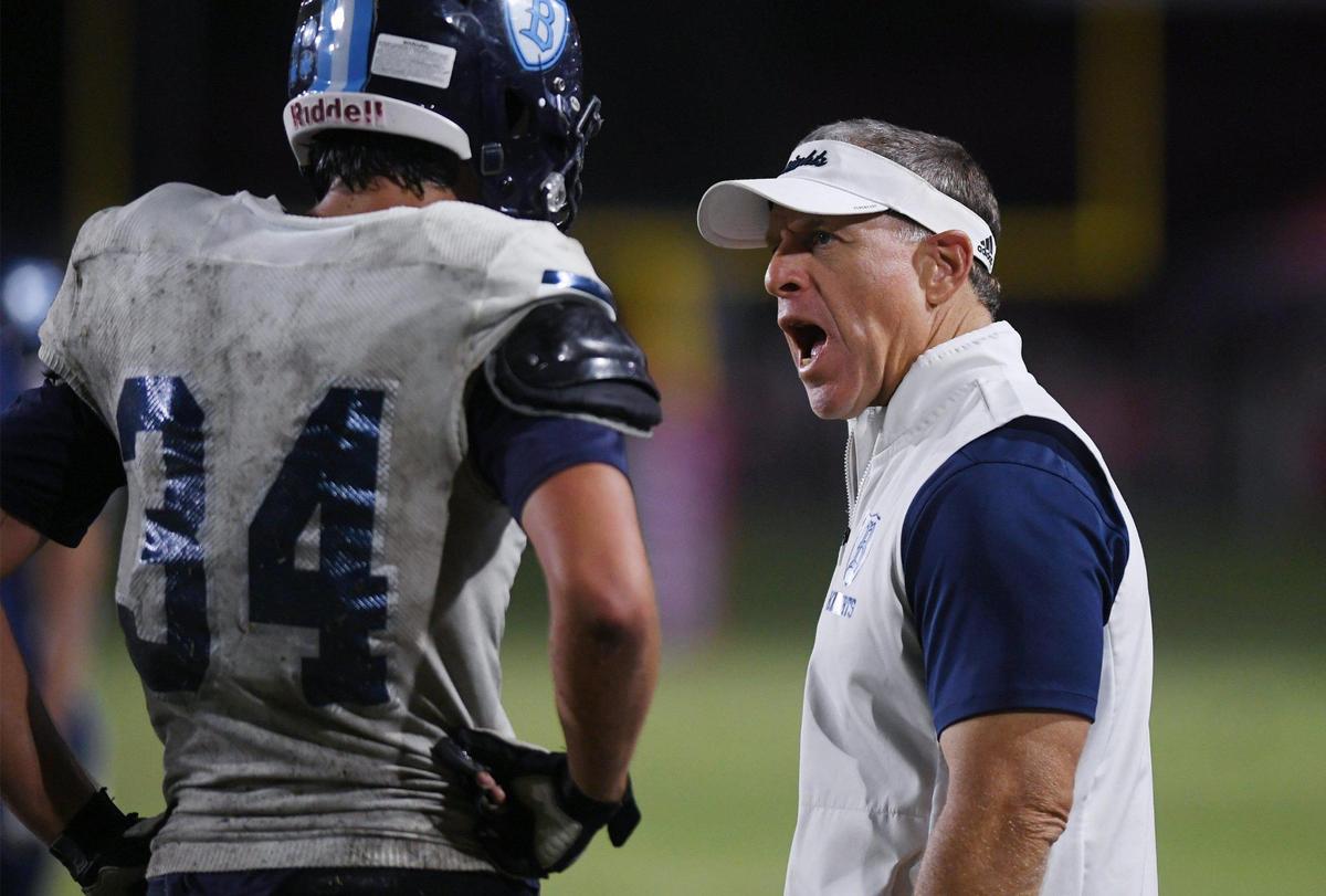 Bullard’s head coach Don Arax, right, appears to admonish Wyatt Clarke, left, after Sanger scored its last touchdown at Tom Flores Stadium Friday, Oct. 21, 2022 in Sanger.