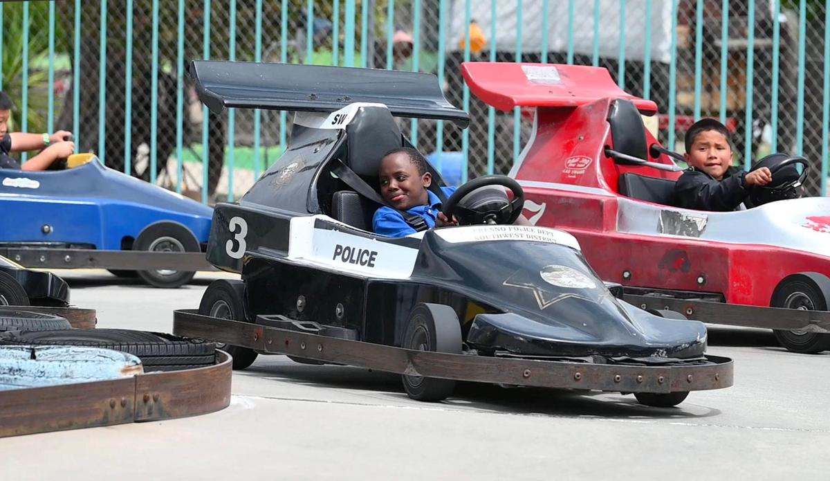 Kids ride the race cars at Blackbeard’s Family Entertainment Center on Thursday, April 17, 2025 in Fresno.
