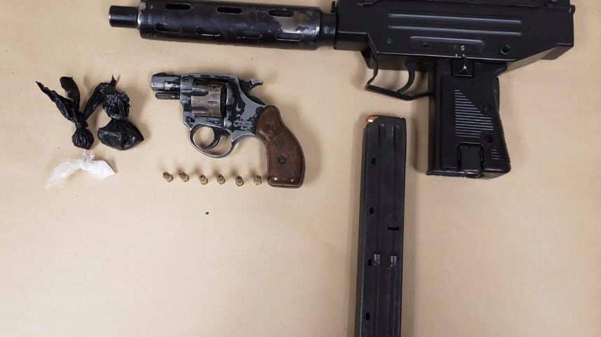 Guns and meth were found by police Wednesday, Dec. 30, 2021 after officers responded to a shots fired call in the area of U Street near 11th Street.