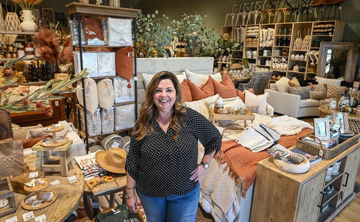 Teresa Pries, owner of Revival 23, stands in her new business, the first business to open up at The Row at Heritage Grove shopping center at Shepherd and Willow in Clovis, on Thursday, April 7, 2022.