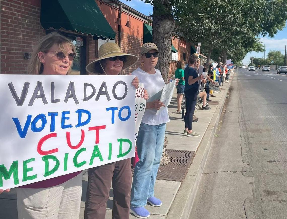 Constituents outside of Republican Rep. David Valadao’s Hanford office on Friday, May 23, calling out his vote to pass the proposed cuts to Medicaid.