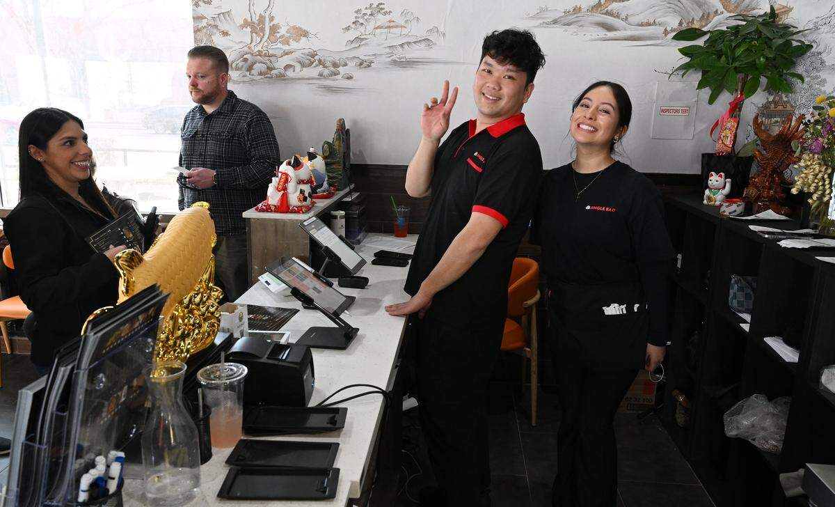 Staff pose for the camera at the new Jingle Bao, one of four new restaurants that have opened in Fresno or Clovis in January, 2026. Photographed Friday afternoon, Jan. 30, 2026 in Fresno.