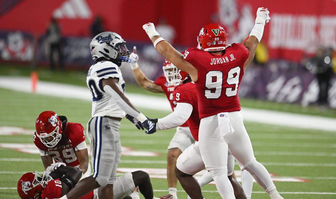 Fresno State celebrates recovering Nevada's tipped pass during the first half Saturday, Oct. 4, 2025 in Fresno.