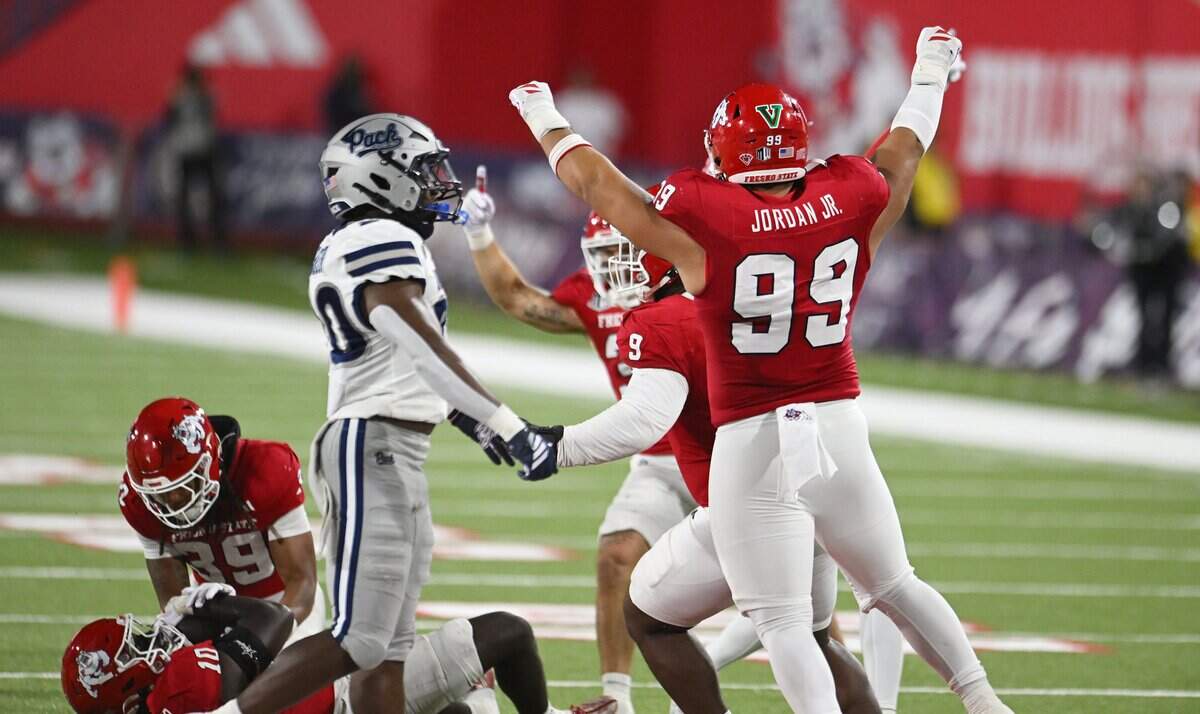 Fresno State celebrates recovering Nevada's tipped pass during the first half Saturday, Oct. 4, 2025 in Fresno.