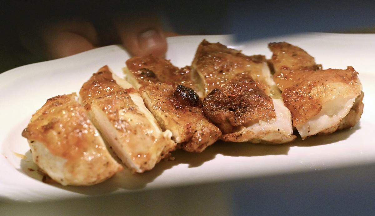Sliced chicken is prepared in the kitchen at Jimmy Pardini's new Italian restaurant Willow Osteria.