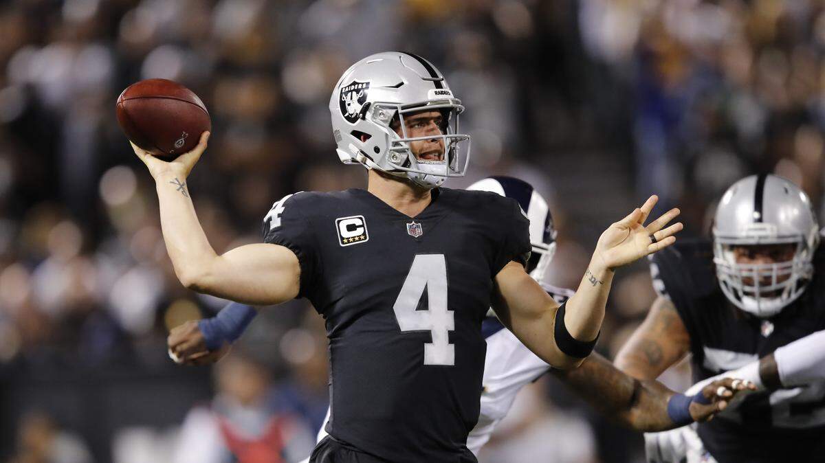 Oakland Raiders quarterback Derek Carr during the first half of an NFL football game against the Los Angeles Rams in Oakland, Calif., Monday, Sept. 10, 2018.