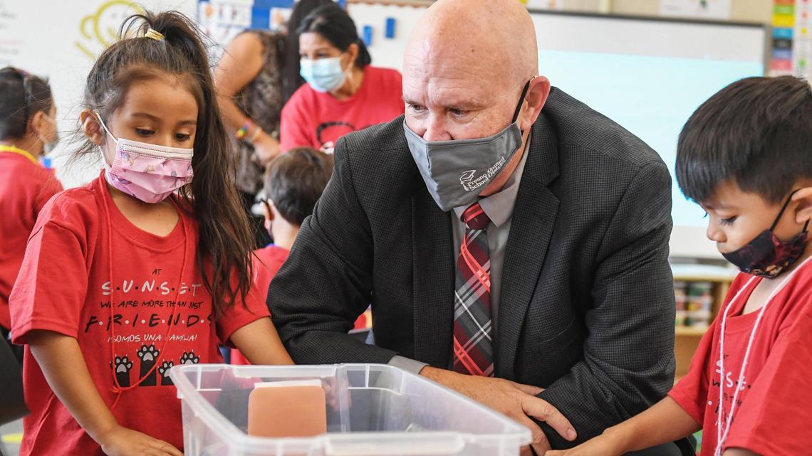 Fresno Unified School District Superintendent Bob Nelson chats with kindergartners at Sunset Elementary School in Fresno during a visit by California Governor Gavin Newsom to sign education legislation on Tuesday, Oct. 5, 2021.
