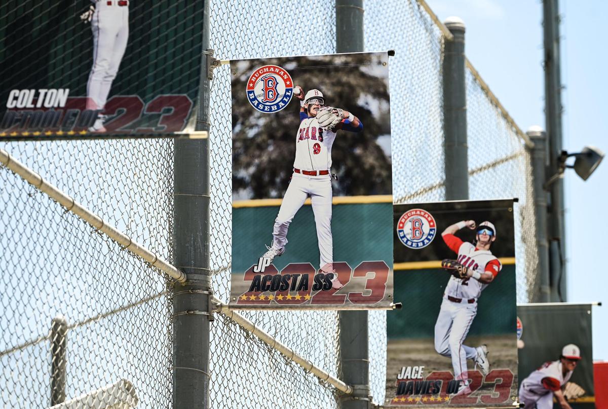 A poster for senior Buchanan shortstop JP Acosta hangs with his teammates at Buchanan’s baseball stadium in Clovis. Acosta is The Bee’s High School Baseball Player of the Year.