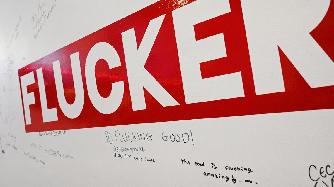 Customers are encouraged to write their own puns using the restaurant name on the wall at Fluckers Nashville Hot Chicken in Fresno on Wednesday, April 13, 2022. The chicken tender place recently opened in the former 559 Taqueria at Cedar and Shepherd avenues.