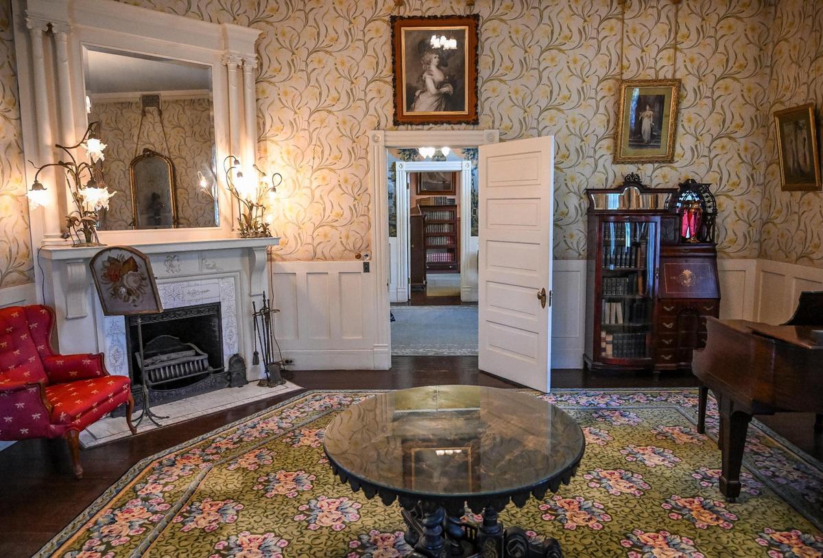 The Parlor of the Kearney Mansion is displayed with antique furniture much like it would have looked at the turn of the twentieth century.