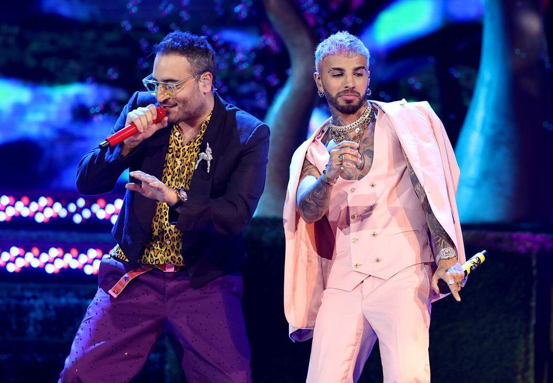 Pictured: Rauw Alejandro and Reik on stage at the Watsco Center in Coral Gables, FL on September 23, 2021.