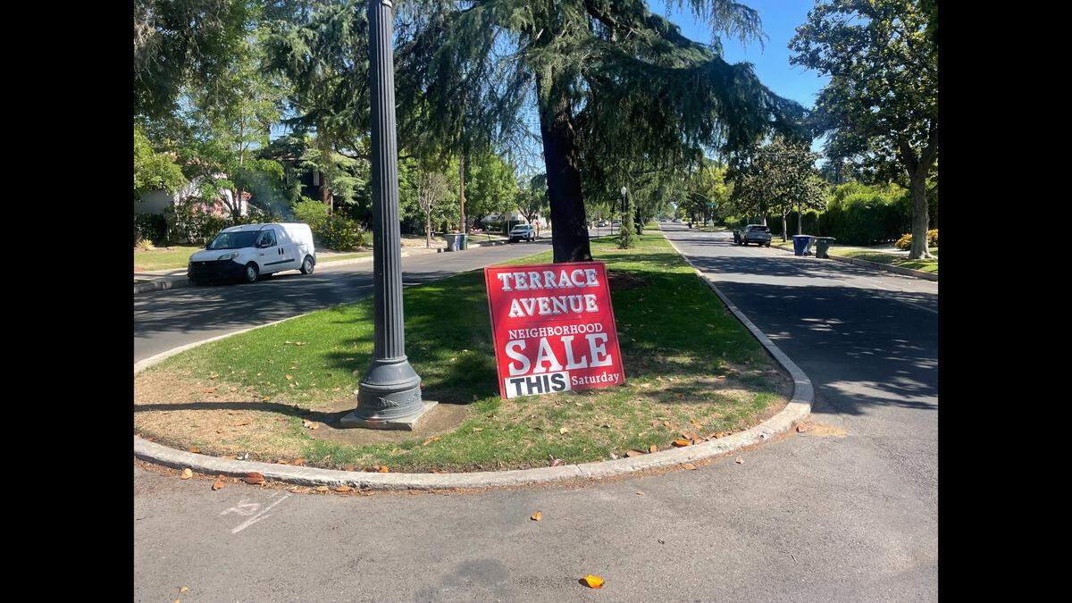 City code enforcement officers are keeping the medians on Van Ness Avenue clear of vendors during Fresno High yard sales this year.