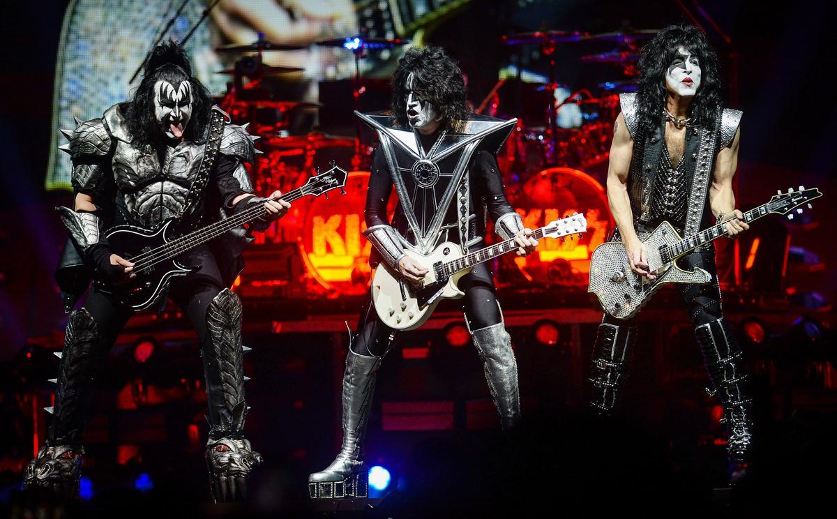 Members of the band KISS — from left, Gene Simmons, Tommy Thayer and Paul Stanley — perform with drummer, Eric Singer, background, during their End of the Road tour at the Save Mart Center in Fresno on Friday, Feb. 8, 2019.