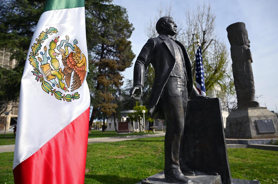 A statue of Benito Juarez stands in downtown’s Courthouse Park as the Consulate of Mexico prepares to celebrate the 219th Anniversary of the birth of Juarez with the first of two planned ceremonies in front of the statue Friday morning, March 21, 2025 in downtown Fresno. Juarez was the first indigenous president of Mexico from 1858 through his death in 1872.