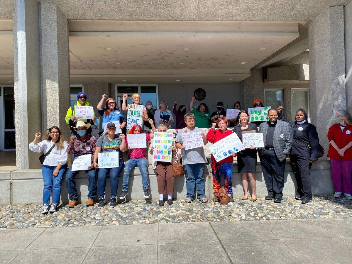 Trails End residents and community supporters rallied in front of the courthouse to oppose the sale of the park to Harmony Communities, less than an hour before the sale was approved by a judge.