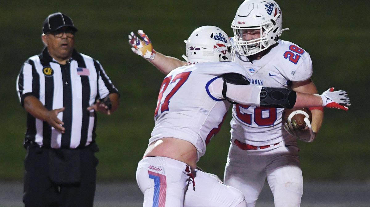 Buchanan’s Gavin Nelson, left, celebrates Caden Rodgers’ touchdown, right, against Edison Friday, Sept 24, 2021 at McLane Stadium in Fresno.