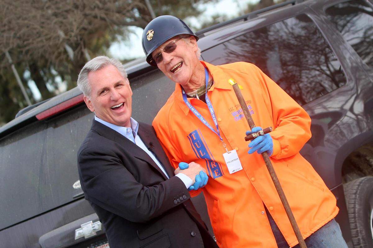 Speaker of the House, Republican Kevin McCarthy of Bakersfield, (left) with a volunteer at the 2023 World Ag Expo in Tulare on Tuesday, Feb. 14, 2023.