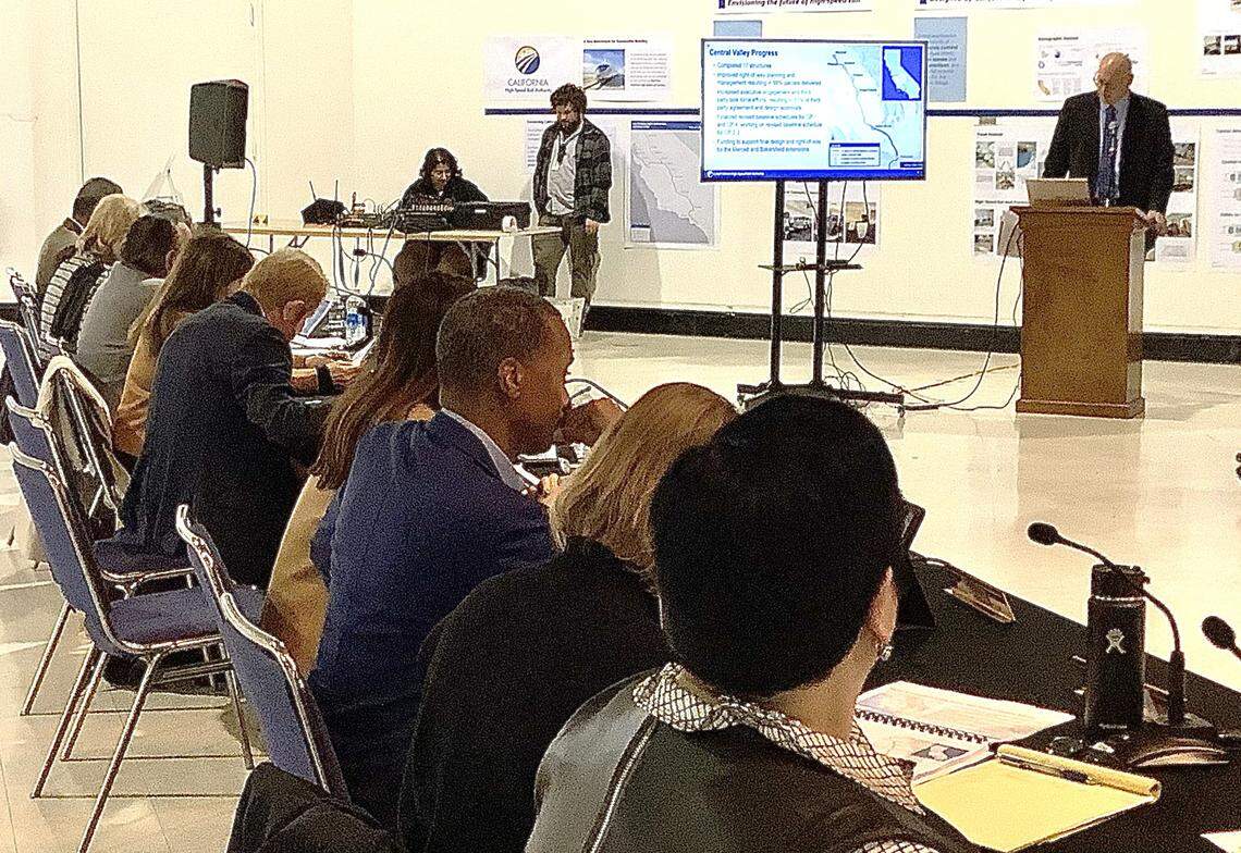 California High-Speed Rail Authority CEO Brian Kelly, standing at right, presents highlights of the rail agency’s 2024 business plan to the authority’s board of directors at their meeting in Sacramento on Thursday, Feb. 29, 2024.