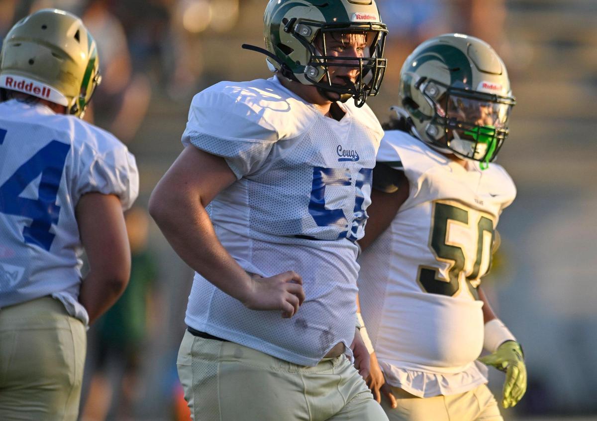 Garces High offensive linemen wear a mix of green or blue numbers on jerseys in the game against Clovis Thursday, Aug. 17, 2023 in Clovis. Shipment of new Garces jerseys for the season were missing the new offensive line jerseys.
