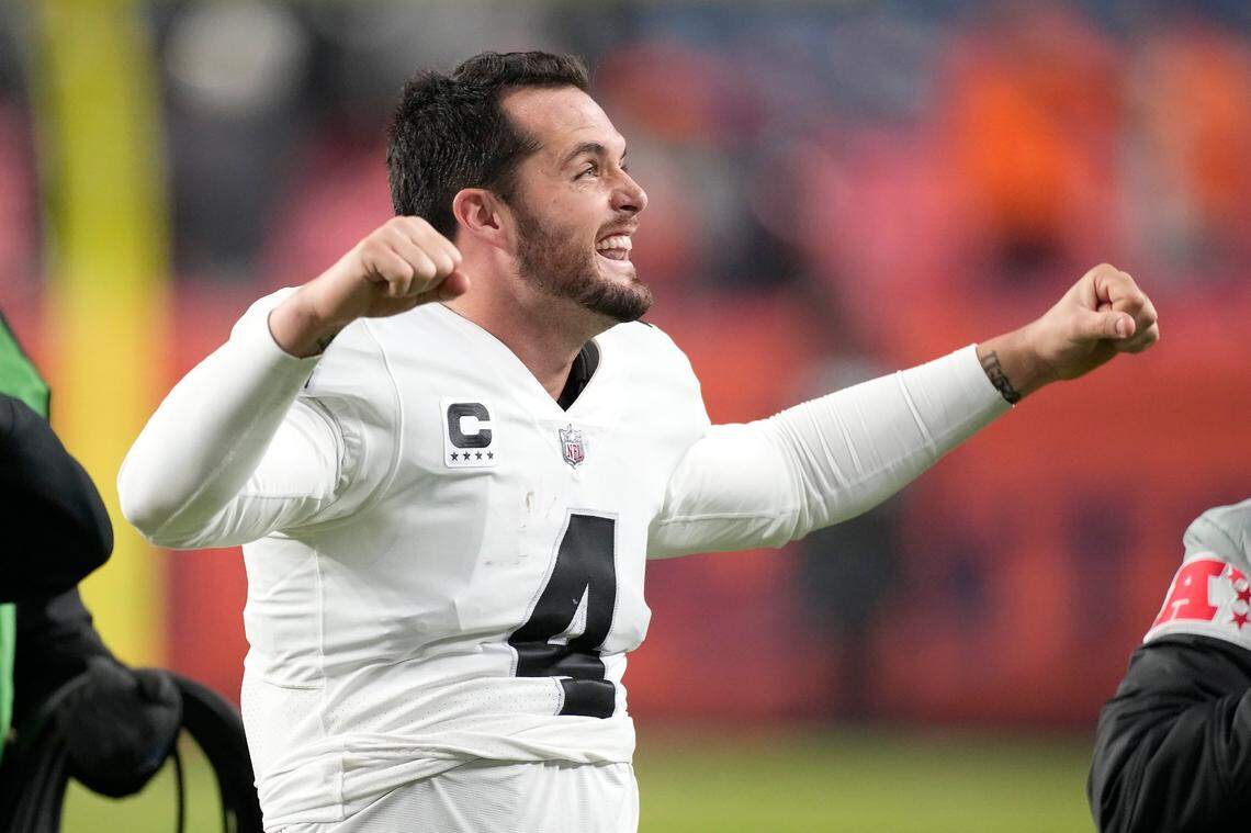 Las Vegas Raiders quarterback Derek Carr celebrates after an NFL game against the Denver Broncos in Denver, Sunday, Nov. 20, 2022. The Raiders won 22-16 in overtime.