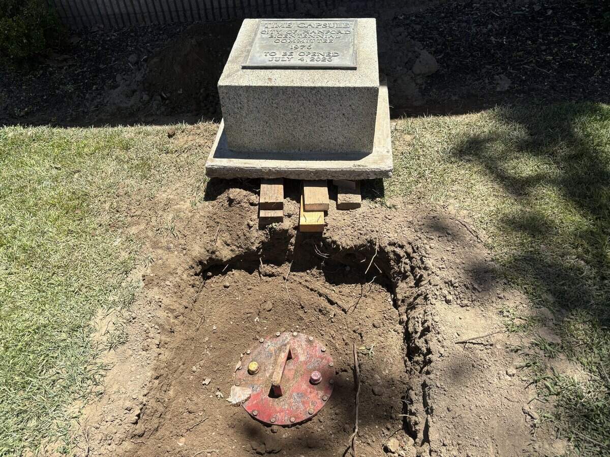 Hanford's public works employees removed the&nbsp;time capsule&nbsp;marker&nbsp;stone&nbsp;exposing the red cylindrical capsule&nbsp;around 12 p.m. on Thursday as the city&nbsp;prepared for&nbsp;its&nbsp;opening later in the day.